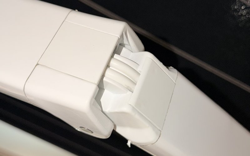 Our awning arm with double-braided vinyl-coated color-matched cables