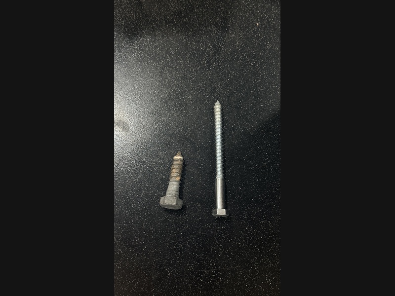 Side by side comparison of competitor 2-inch zinc lag screw versus our 5-inch galvanized lag screw