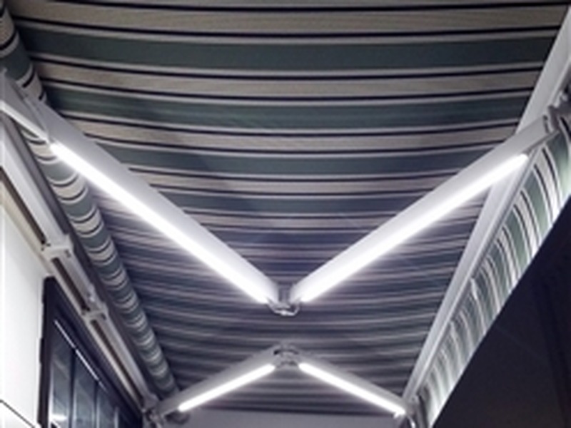 Somfy LED light bars with fully diffused even glow on retractable awning
