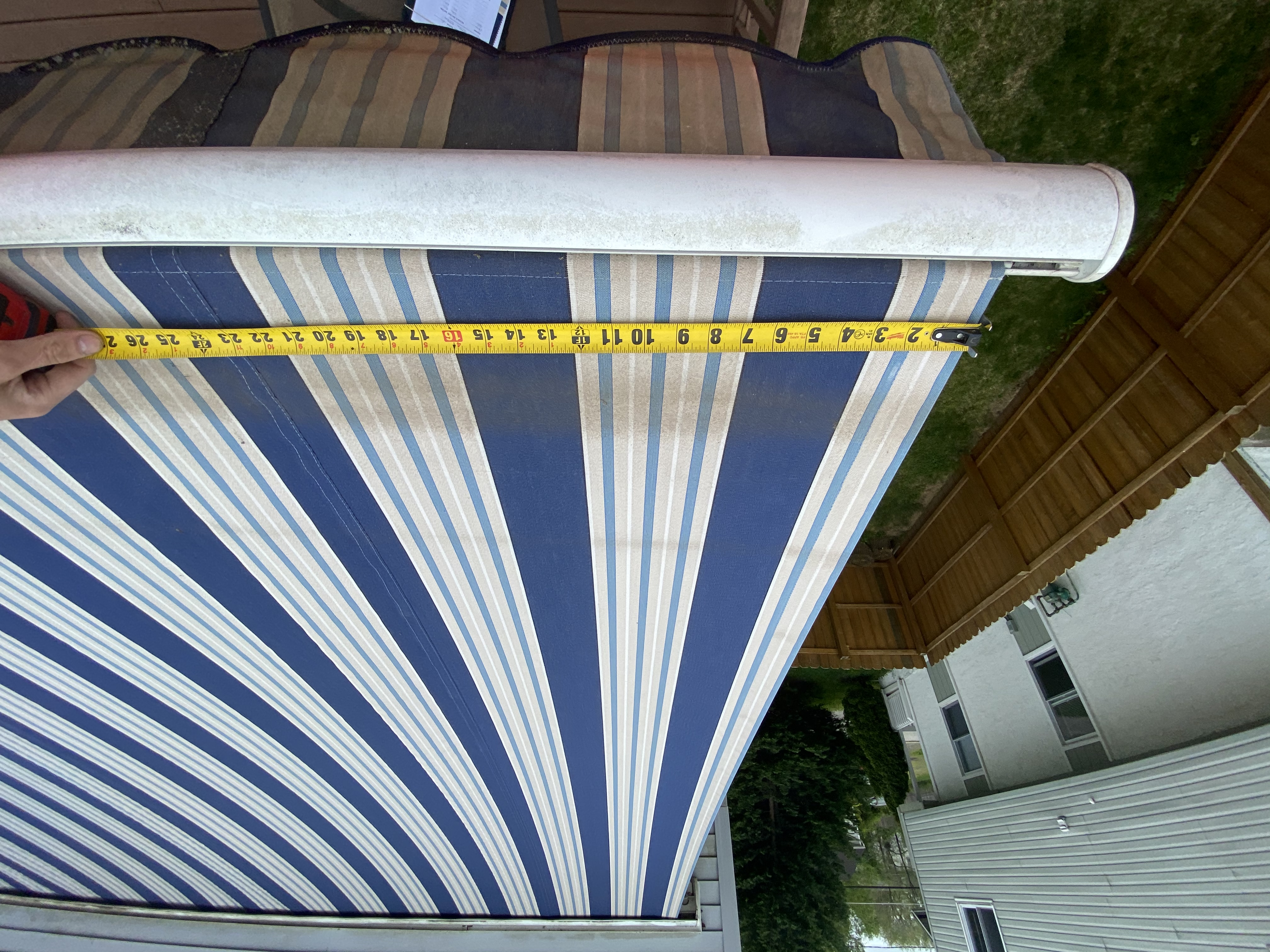 Competitor awning fabric with mold damage from motor not fully retracting