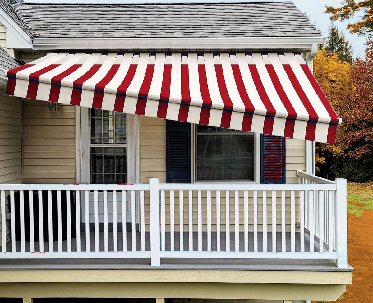 Retractable awning with fabric wrapped around the front bar, tilted to drain water off one side