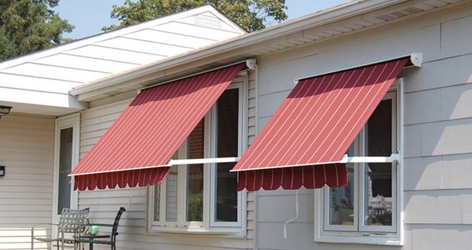 Cottage window awnings with red stripe fabric