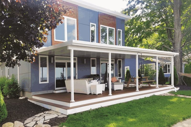 Insulated roof patio cover with outdoor furniture