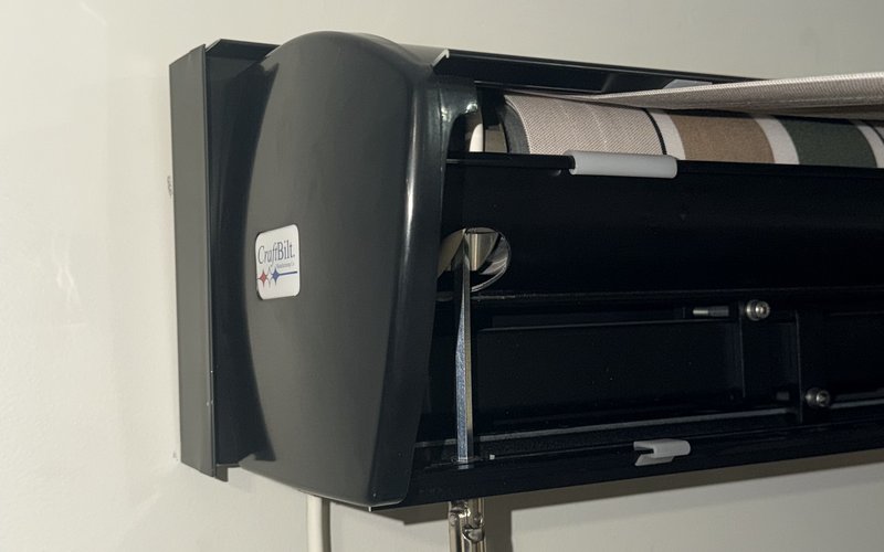 Sunbeam awning installation with color-matched ledger board and custom capping