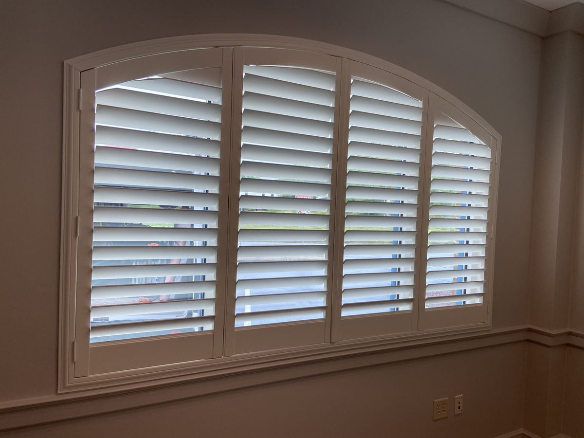 Arched plantation shutters installation