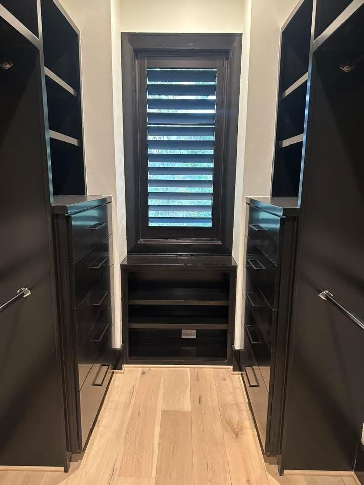 Black plantation shutters walk-in closet
