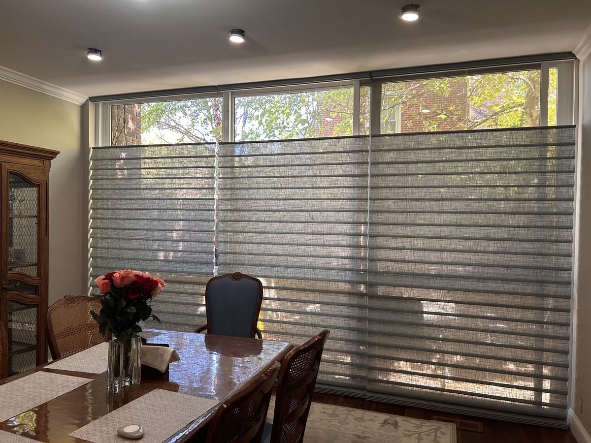 Hunter Douglas Pirouette shades dining room